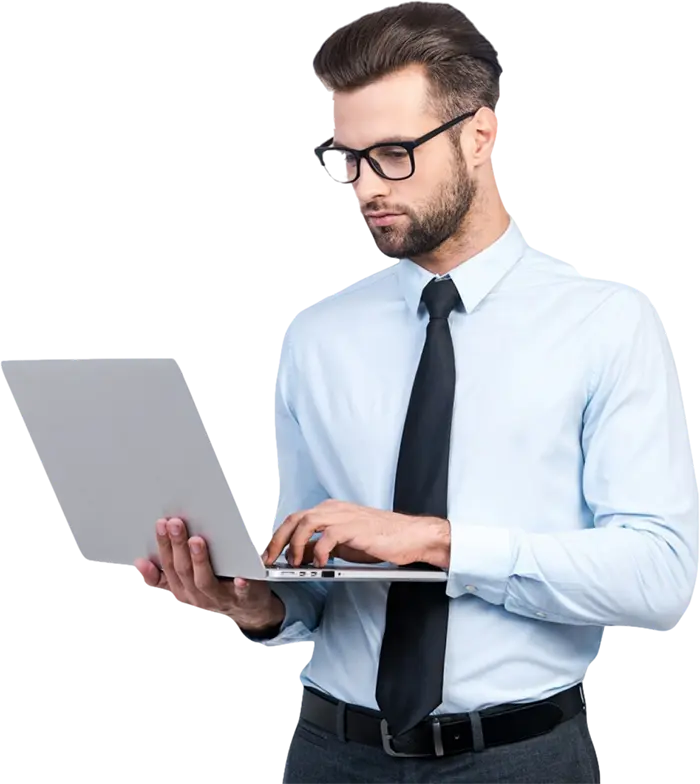 man standing with laptop